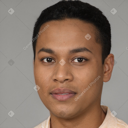 Joyful black young-adult male with short  black hair and brown eyes