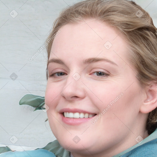 Joyful white young-adult female with medium  brown hair and blue eyes