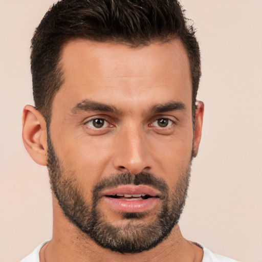 Joyful white young-adult male with short  brown hair and brown eyes