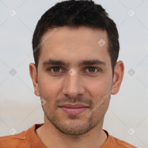 Joyful white young-adult male with short  brown hair and brown eyes