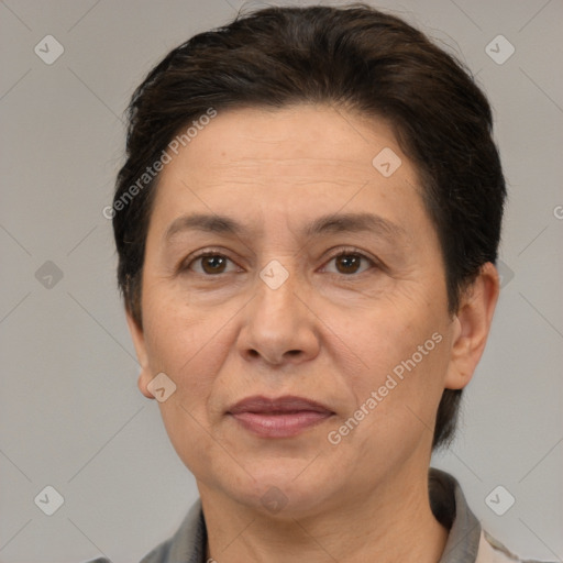 Joyful white adult female with short  brown hair and brown eyes