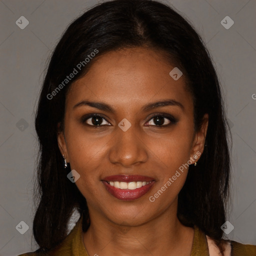 Joyful black young-adult female with long  brown hair and brown eyes