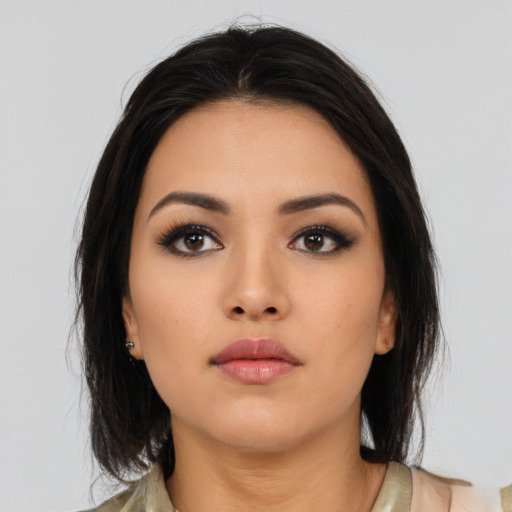 Neutral asian young-adult female with medium  black hair and brown eyes