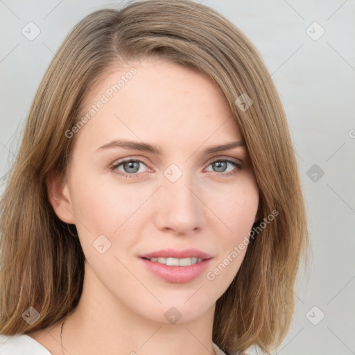 Joyful white young-adult female with medium  brown hair and blue eyes