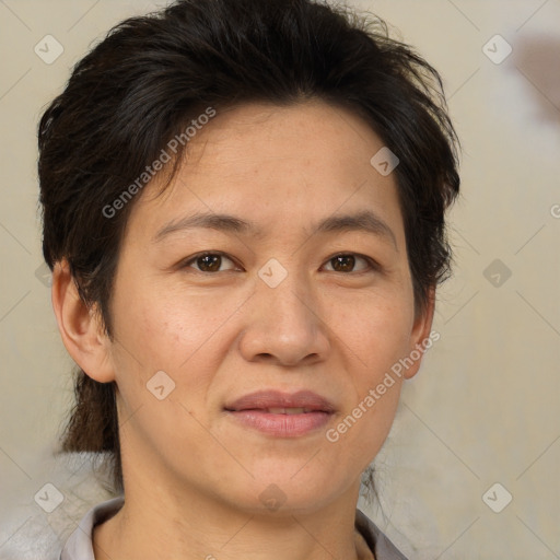 Joyful white adult female with short  brown hair and brown eyes