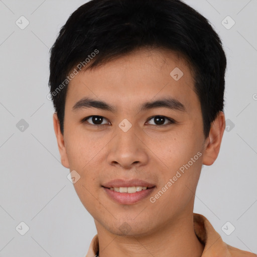 Joyful asian young-adult male with short  brown hair and brown eyes