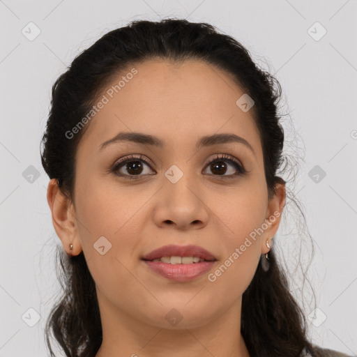 Joyful latino young-adult female with long  brown hair and brown eyes