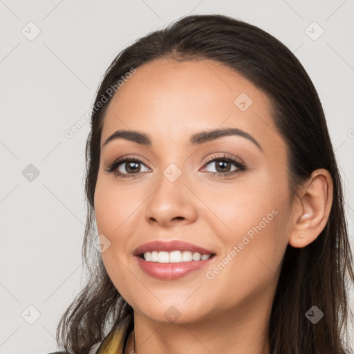 Joyful white young-adult female with long  brown hair and brown eyes