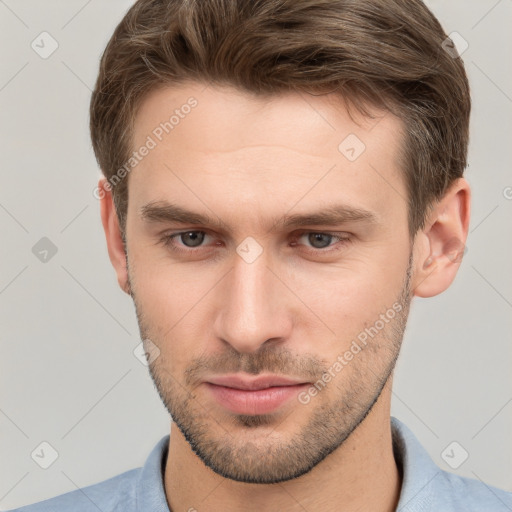 Neutral white young-adult male with short  brown hair and grey eyes