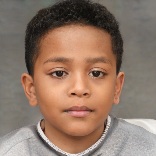 Neutral black child male with short  brown hair and brown eyes