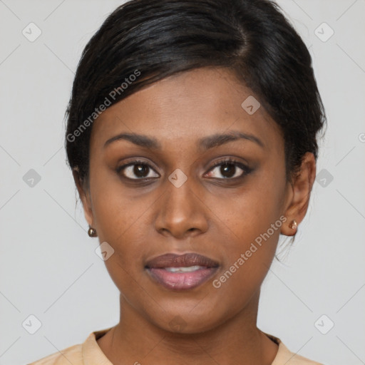 Joyful black young-adult female with short  brown hair and brown eyes