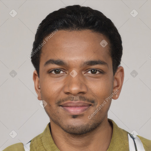 Joyful black young-adult male with short  black hair and brown eyes