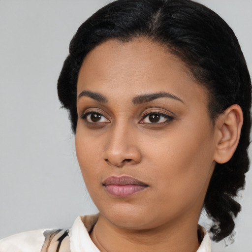 Neutral asian young-adult female with medium  black hair and brown eyes
