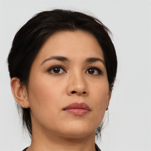 Neutral asian young-adult female with medium  brown hair and brown eyes