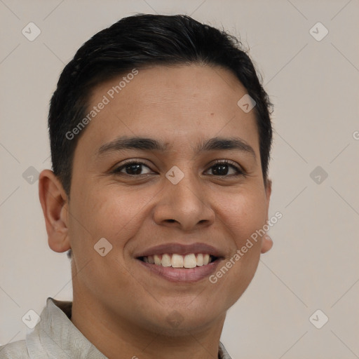 Joyful latino young-adult male with short  brown hair and brown eyes