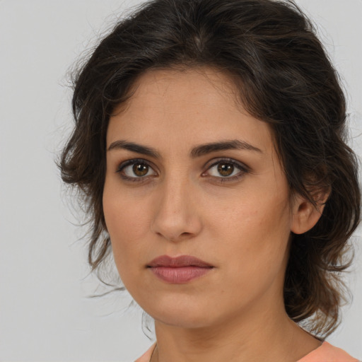 Neutral white young-adult female with medium  brown hair and brown eyes