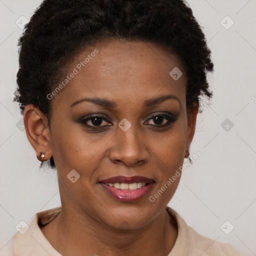 Joyful black young-adult female with short  brown hair and brown eyes