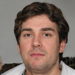 Neutral white adult male with short  brown hair and brown eyes