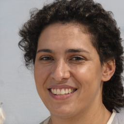 Joyful white adult female with short  brown hair and brown eyes