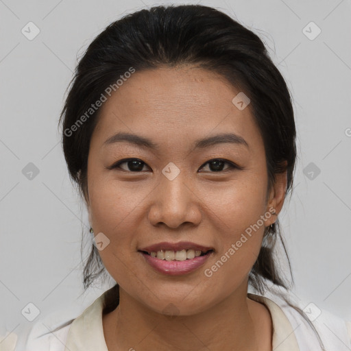 Joyful asian young-adult female with medium  brown hair and brown eyes