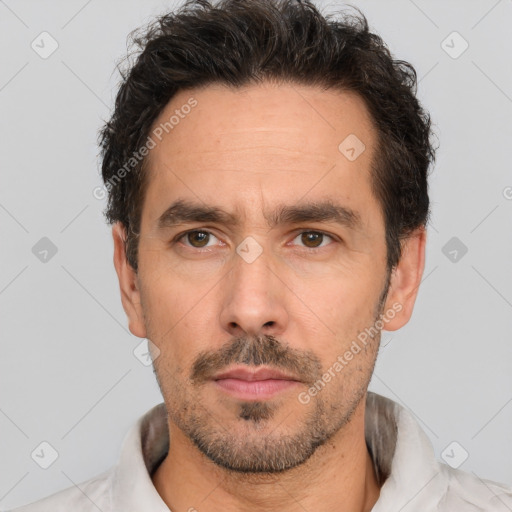 Neutral white adult male with short  black hair and brown eyes