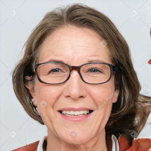 Joyful white adult female with medium  brown hair and blue eyes