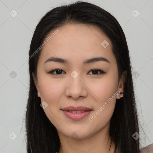 Joyful asian young-adult female with long  brown hair and brown eyes