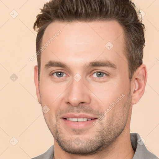 Joyful white young-adult male with short  brown hair and brown eyes