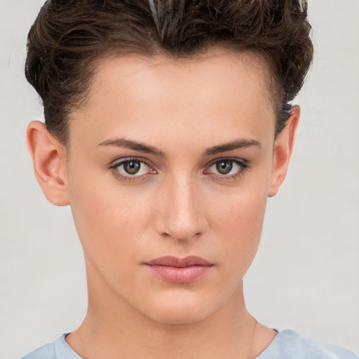 Neutral white young-adult female with short  brown hair and brown eyes