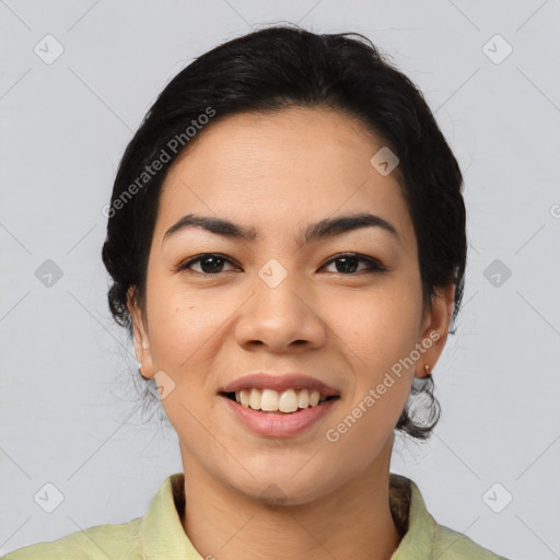 Joyful asian young-adult female with medium  black hair and brown eyes