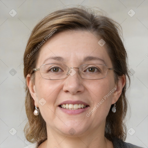 Joyful white adult female with medium  brown hair and grey eyes