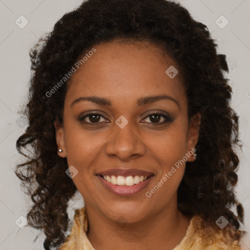 Joyful black young-adult female with medium  brown hair and brown eyes