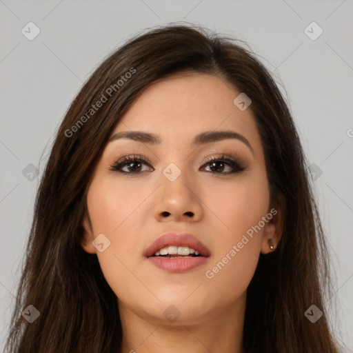 Joyful asian young-adult female with long  brown hair and brown eyes