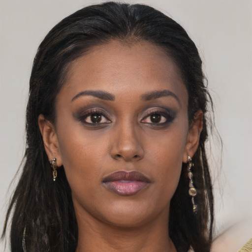 Neutral black young-adult female with long  brown hair and brown eyes