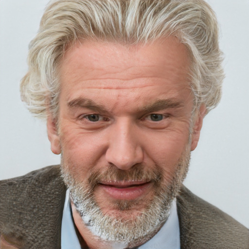 Joyful white middle-aged male with short  brown hair and blue eyes