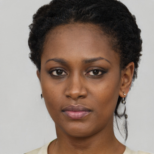 Neutral black young-adult female with short  brown hair and brown eyes