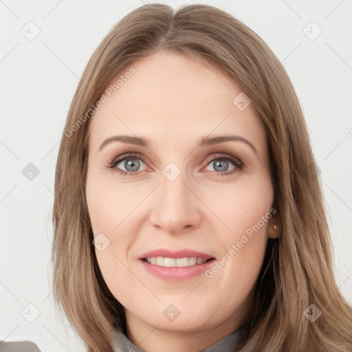 Joyful white young-adult female with long  brown hair and grey eyes