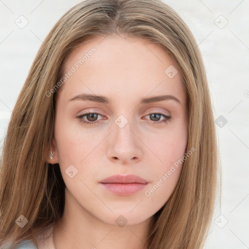 Neutral white young-adult female with long  brown hair and brown eyes