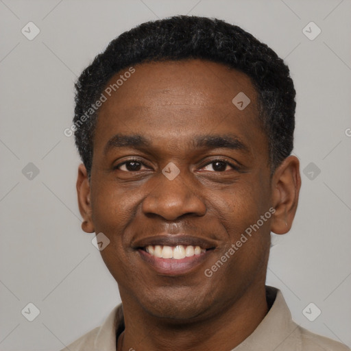 Joyful black young-adult male with short  black hair and brown eyes