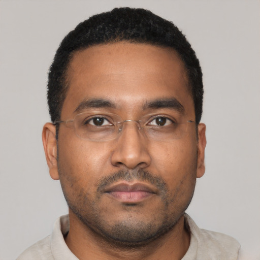 Neutral black young-adult male with short  black hair and brown eyes