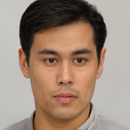 Neutral asian young-adult male with short  brown hair and brown eyes