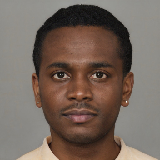 Neutral black young-adult male with short  brown hair and brown eyes