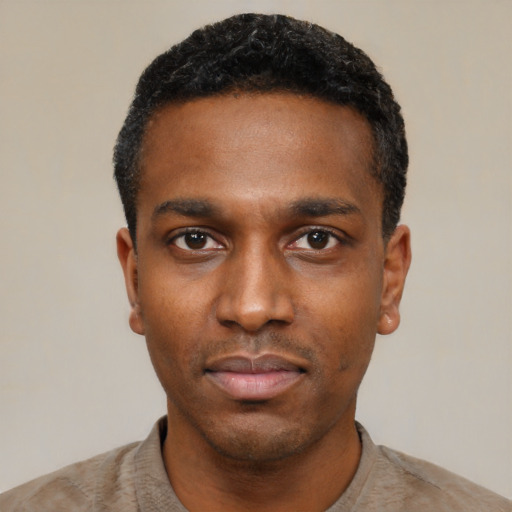 Neutral black young-adult male with short  black hair and brown eyes