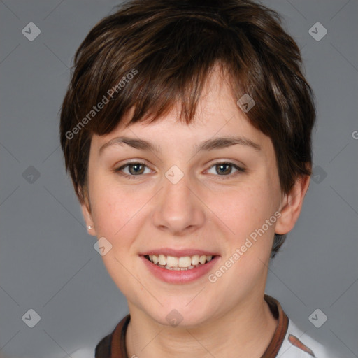 Joyful white young-adult female with short  brown hair and grey eyes