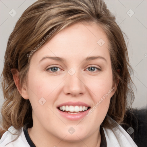 Joyful white young-adult female with medium  brown hair and blue eyes