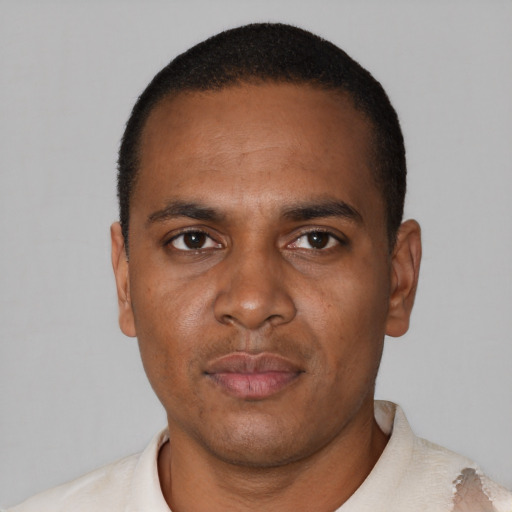 Neutral black young-adult male with short  black hair and brown eyes
