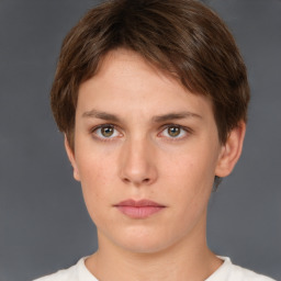 Neutral white young-adult female with short  brown hair and brown eyes