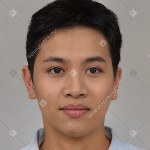 Joyful asian young-adult male with short  black hair and brown eyes