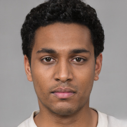 Neutral black young-adult male with short  black hair and brown eyes