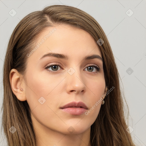 Neutral white young-adult female with long  brown hair and brown eyes